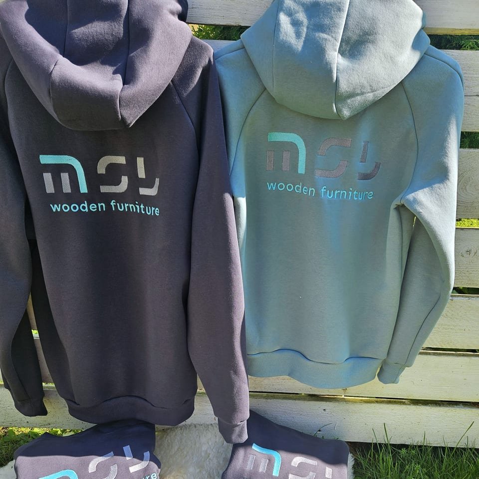 Company hoodies embroidered on the back