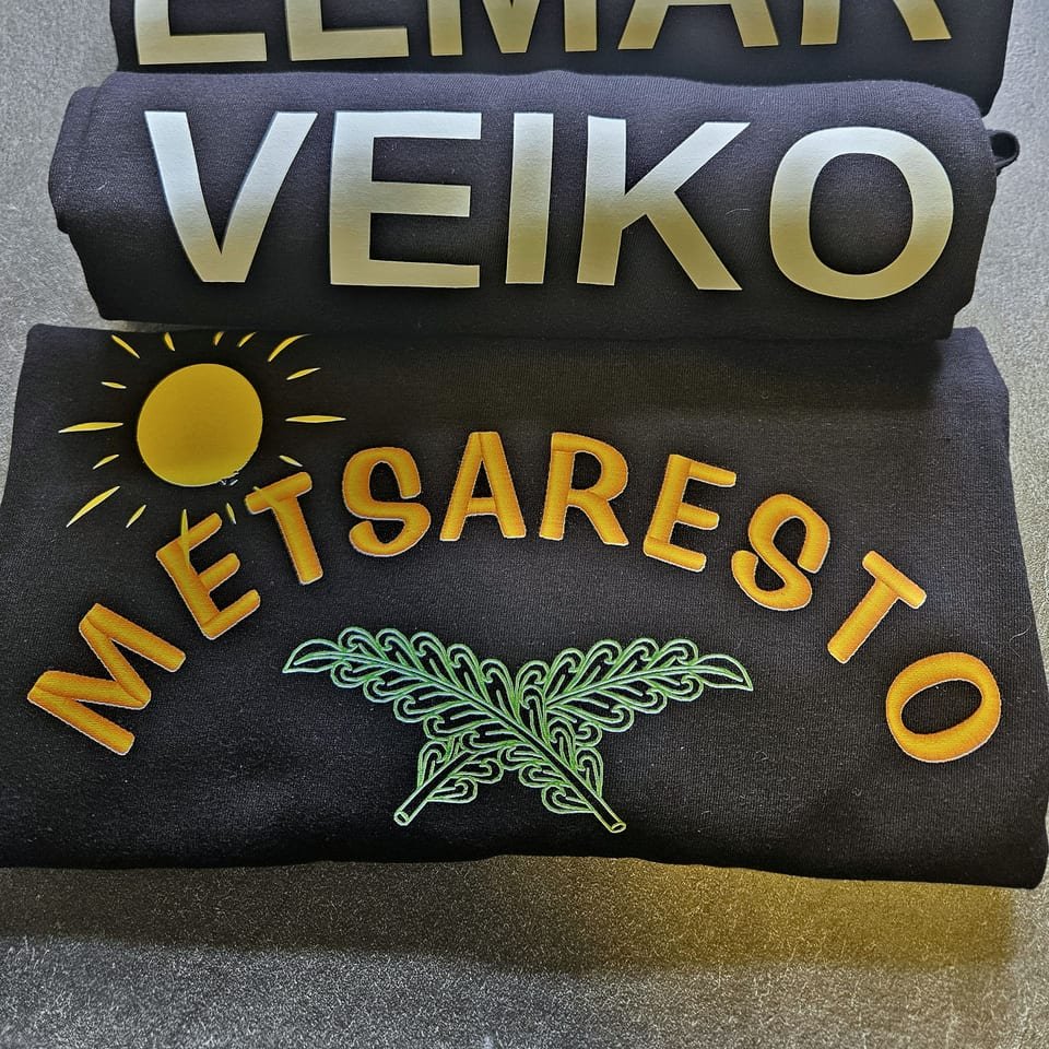 T-shirts with a restaurant logo and names