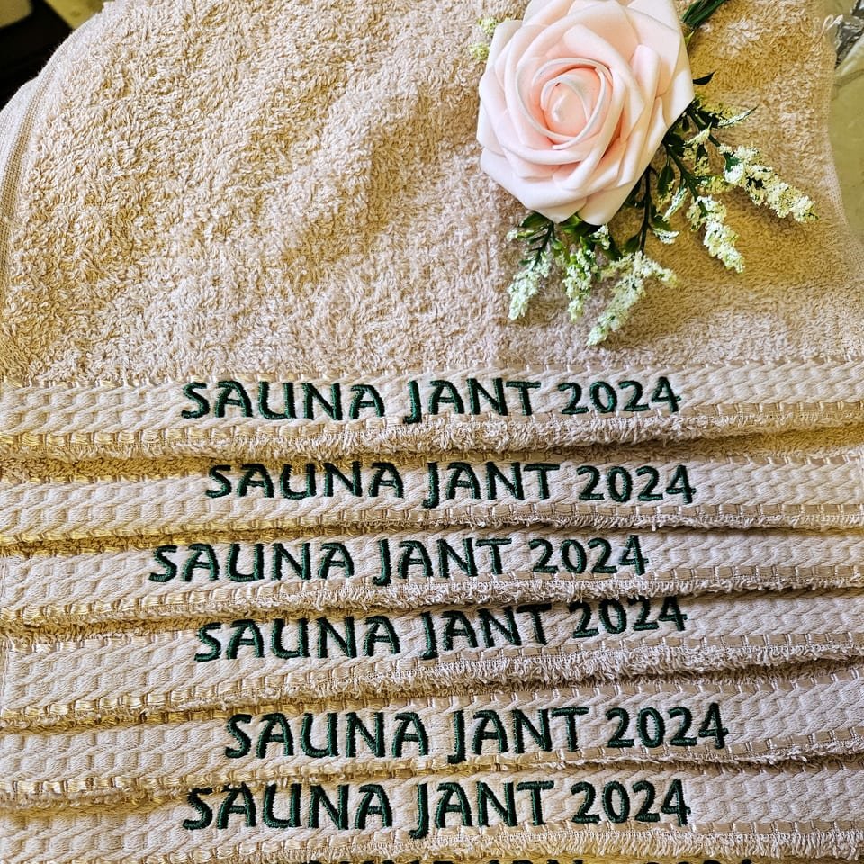Sauna towels embroidered for an event